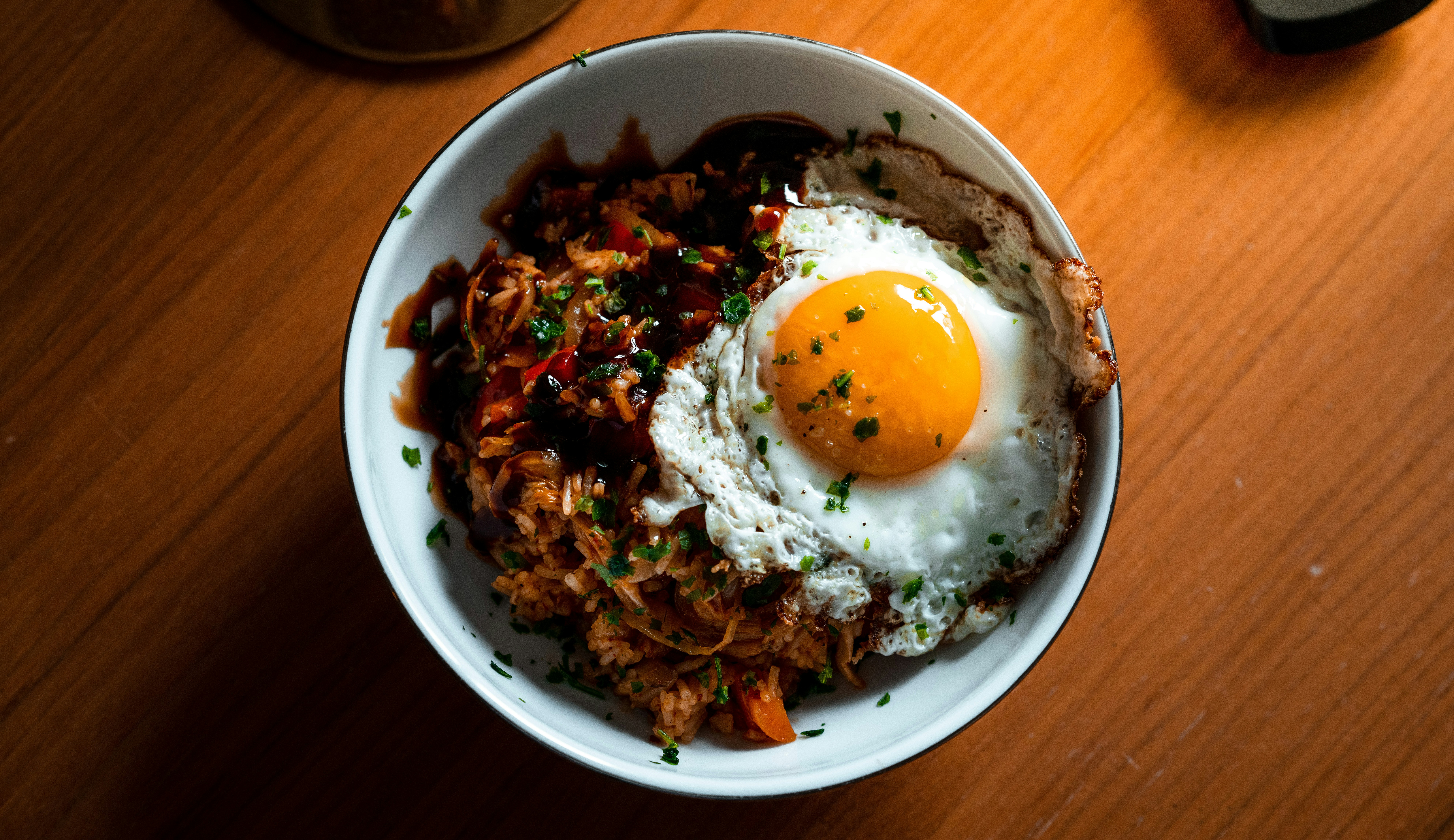 picture of kimchi fried rice with egg on top